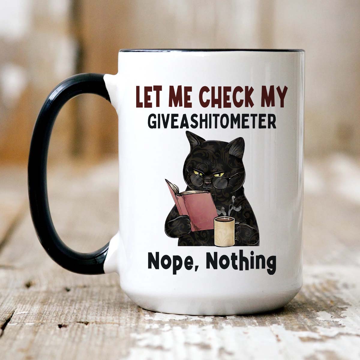 Ceramic coffee mug featuring the humorous Giveashitometer design, perfect for cat lovers.