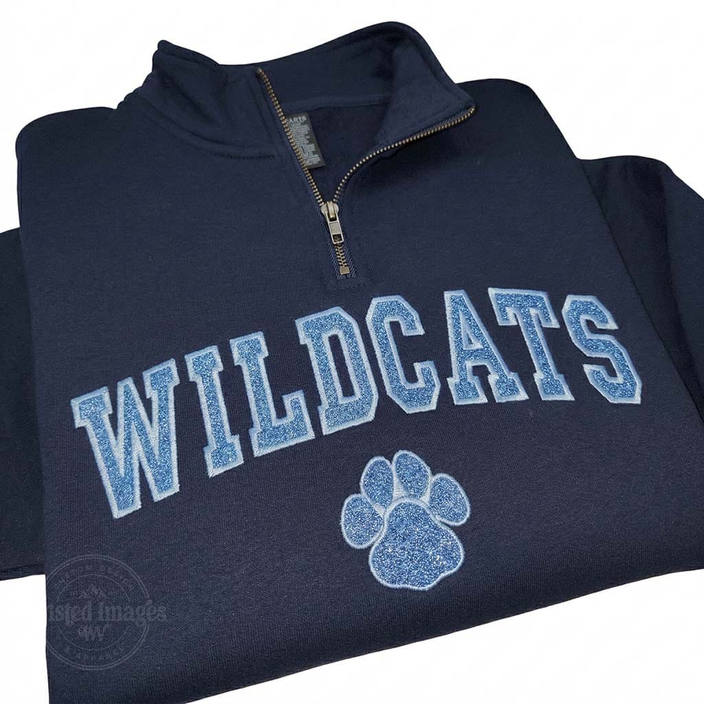 Navy blue pullover with 'WILDCATS' text and paw print on a white background