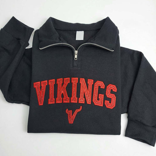 Black pullover with 'VIKINGS' embroidered in red on a white background